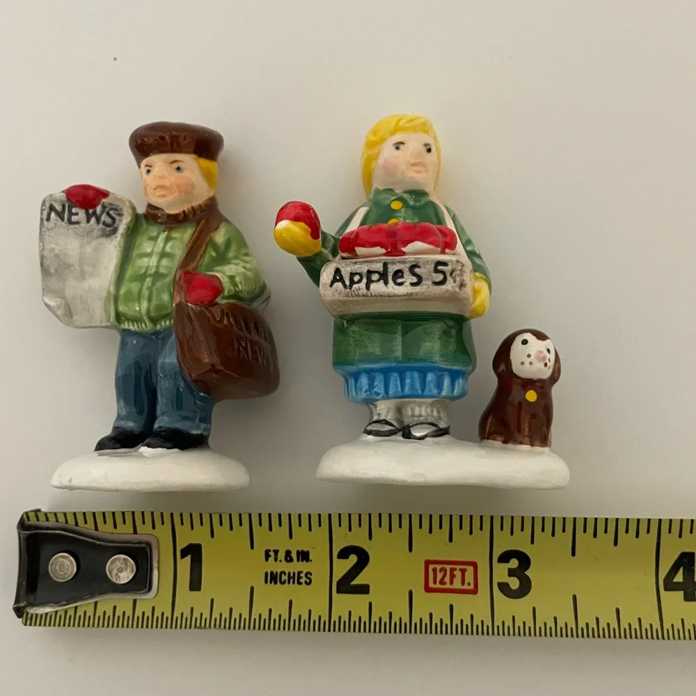 Dept 56 Set/2 snow village figurines girl selling apples and news boy